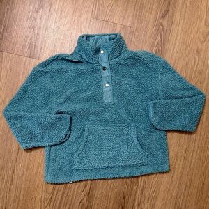 Teal colored half buttoned sweater in an XL